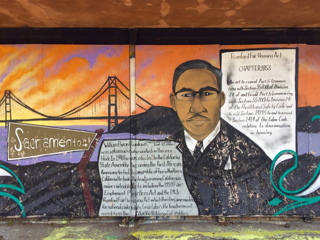 Colorful mural of Bryon Rumford