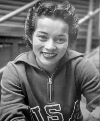 Black/white photograph of a smiling woman